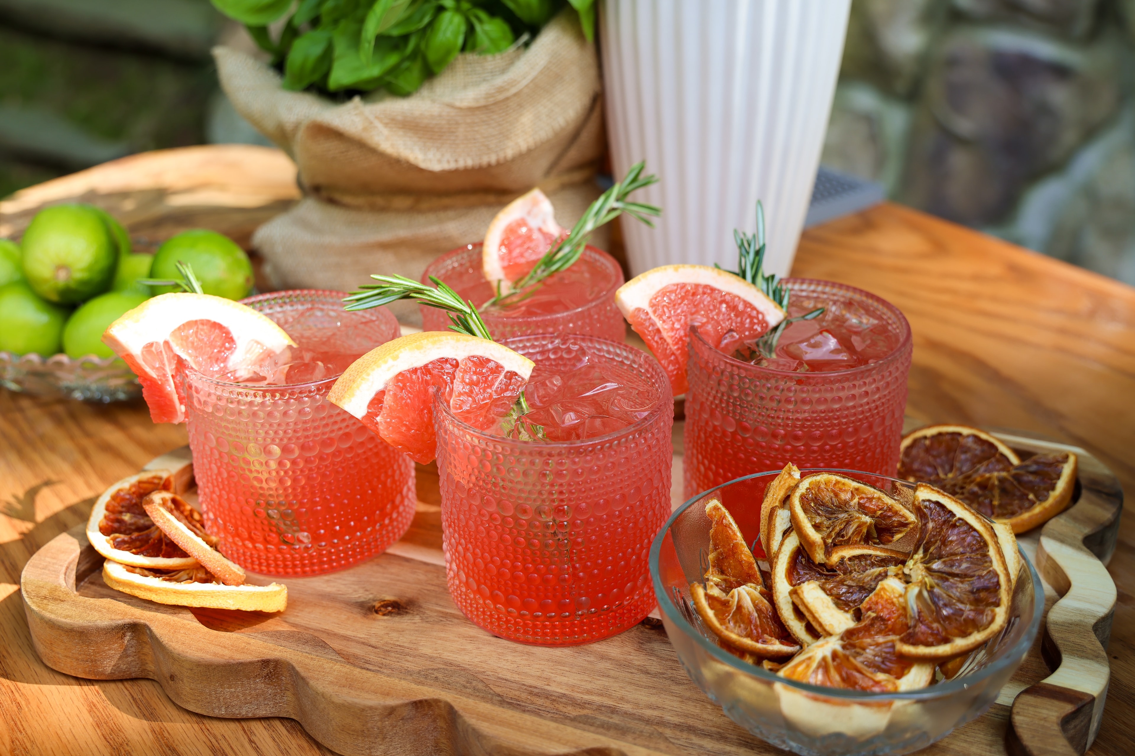 Grapefruit cocktails with rosemary garnish